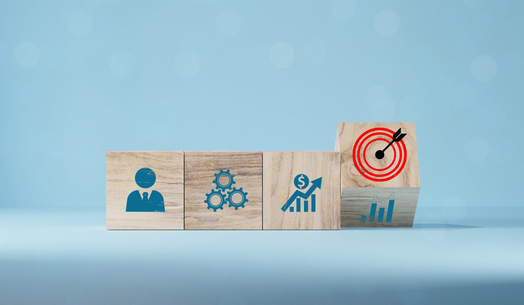 tablica celownicza i strzałka, które drukują ekran na drewnianym sześcianie